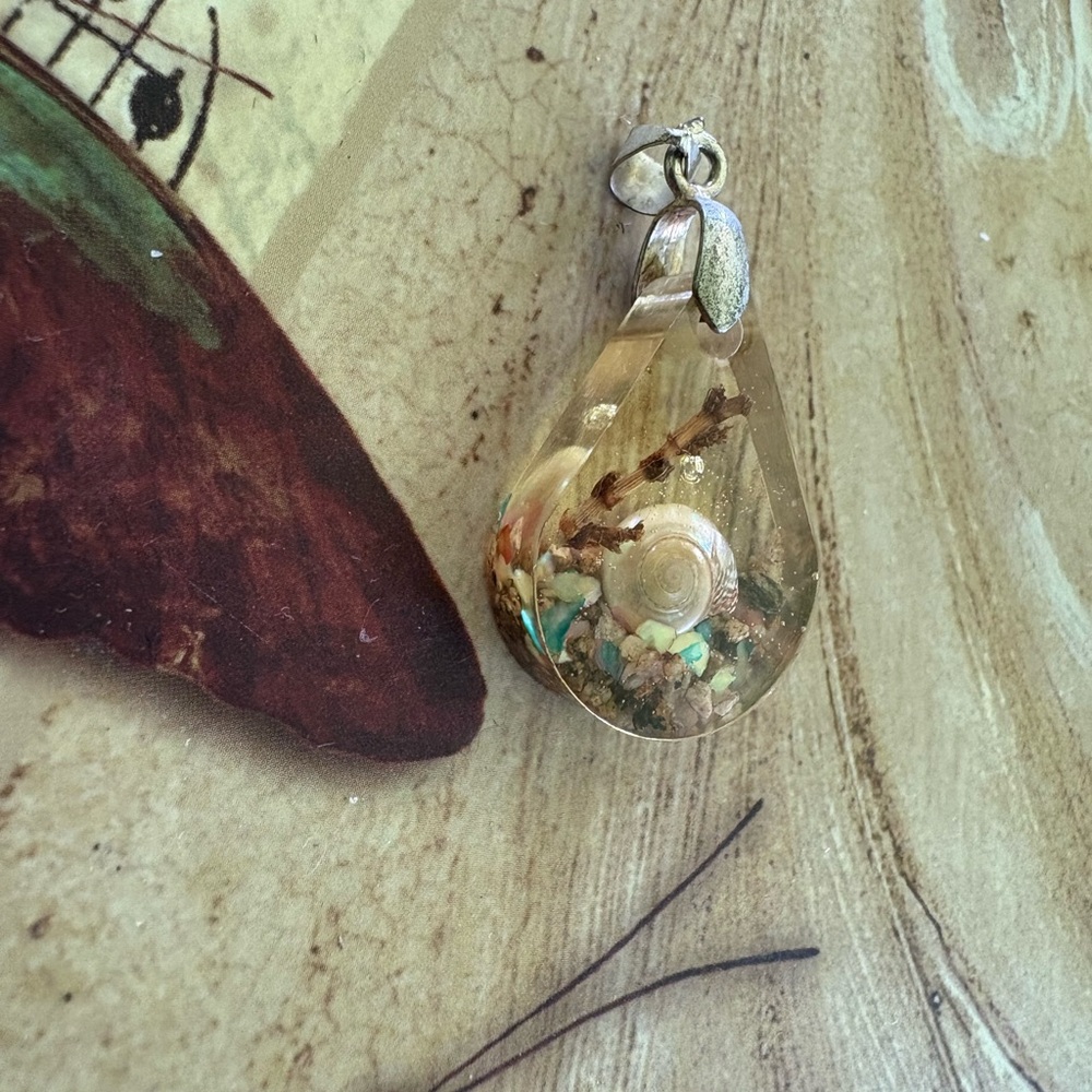 Elegant sea shell Pendant with ocean Designs and sand handmade unique designs